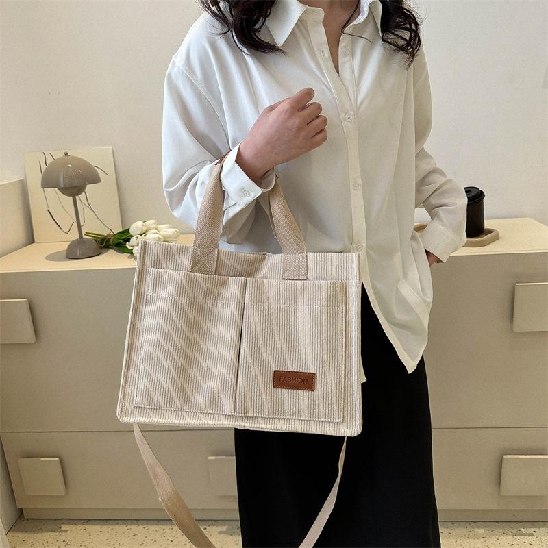 Corduroy large-capacity fashion handbag autumn and winter new shoulder bag tote bag
Corduroy large-capacity fashion handbag autumn and winter new shoulder bag tote bag