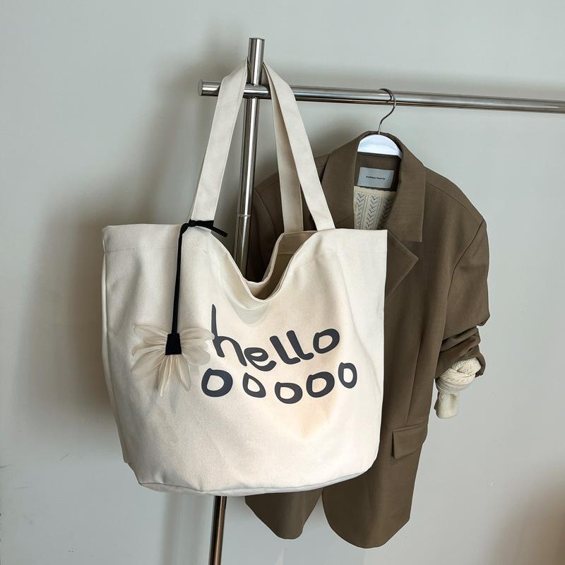 Casual canvas bag Korean lazy style armpit bag women s 2025 new large-capacity letter print shoulder tote bag
Casual canvas bag Korean lazy style armpit bag women s 2025 new large-capacity letter print shoulder tote bag