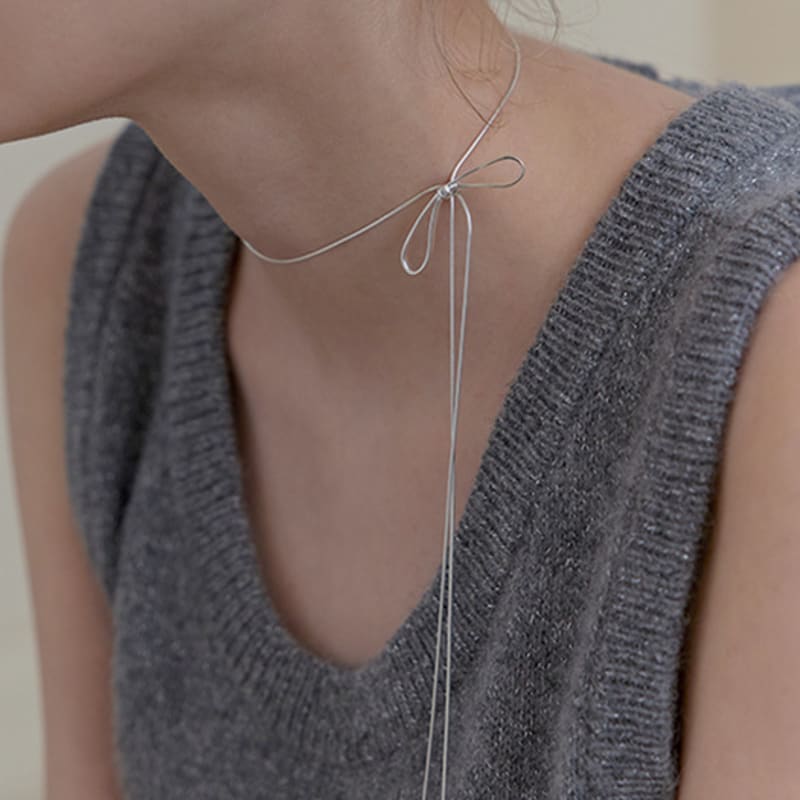 Life Tie-drop ribbon necklace Silver
Life Tie-drop ribbon necklace Silver