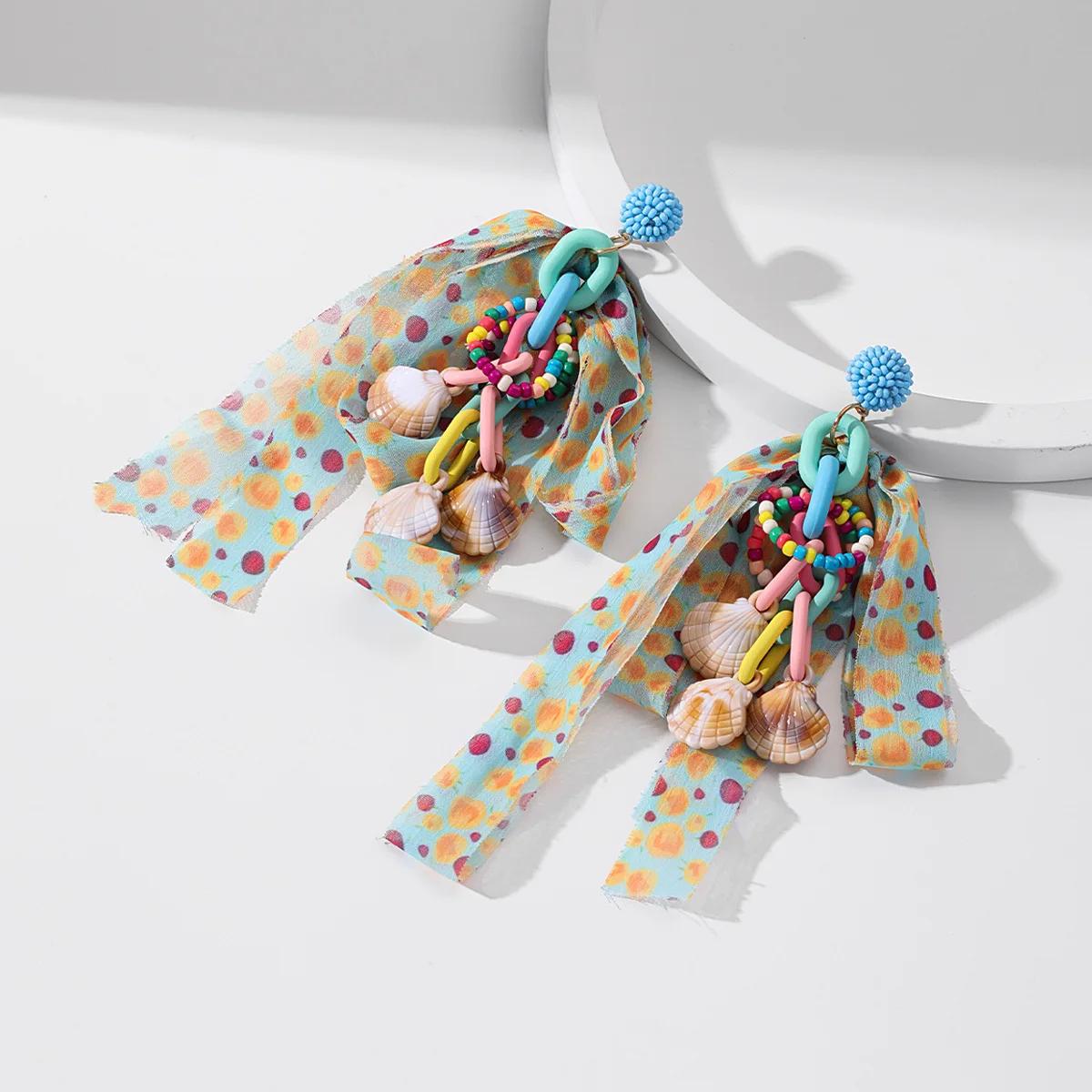 Colored Polka Dot Chiffon Bow Earrings for Women Design Rice Beads Long Ring Shell Fringe Earrings
Colored Polka Dot Chiffon Bow Earrings for Women Design Rice Beads Long Ring Shell Fringe Earrings
