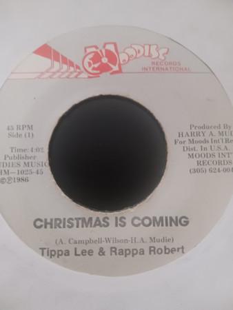 7inch Record TIPPA LEE & RAPPA ROBERT - Christmas Is Coming NONE Moodisc Records 1986 Jamaica Reggae, Ska & Dub Used
7inch Record TIPPA LEE & RAPPA ROBERT - Christmas Is Coming NONE Moodisc Records 1986 Jamaica Reggae, Ska & Dub Used