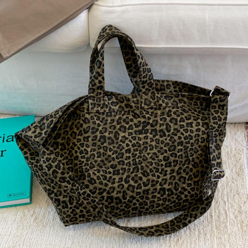 Simple lazy style leopard print canvas bag large capacity messenger bag student shoulder bag camouflage shopping bag леопард друку кольору
Simple lazy style leopard print canvas bag large capacity messenger bag student shoulder bag camouflage shopping bag леопард друку кольору