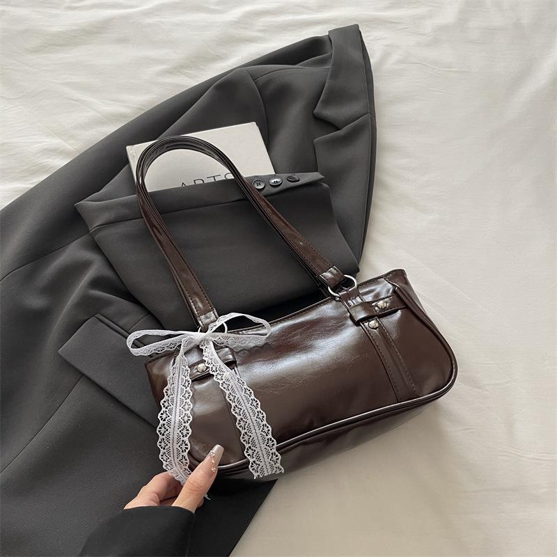 Niche bag women s new bow pillow bag shoulder messenger bag portable baguette bag коричневий
Niche bag women s new bow pillow bag shoulder messenger bag portable baguette bag коричневий