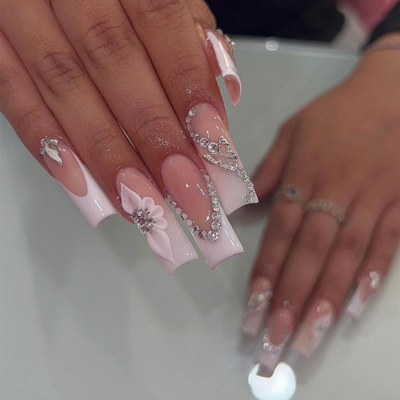 Long French White Edge Press-On Nails with Rhinestone, Flower & Butterfly Art - 24-Piece Set Glue Edition
Long French White Edge Press-On Nails with Rhinestone, Flower & Butterfly Art - 24-Piece Set Glue Edition