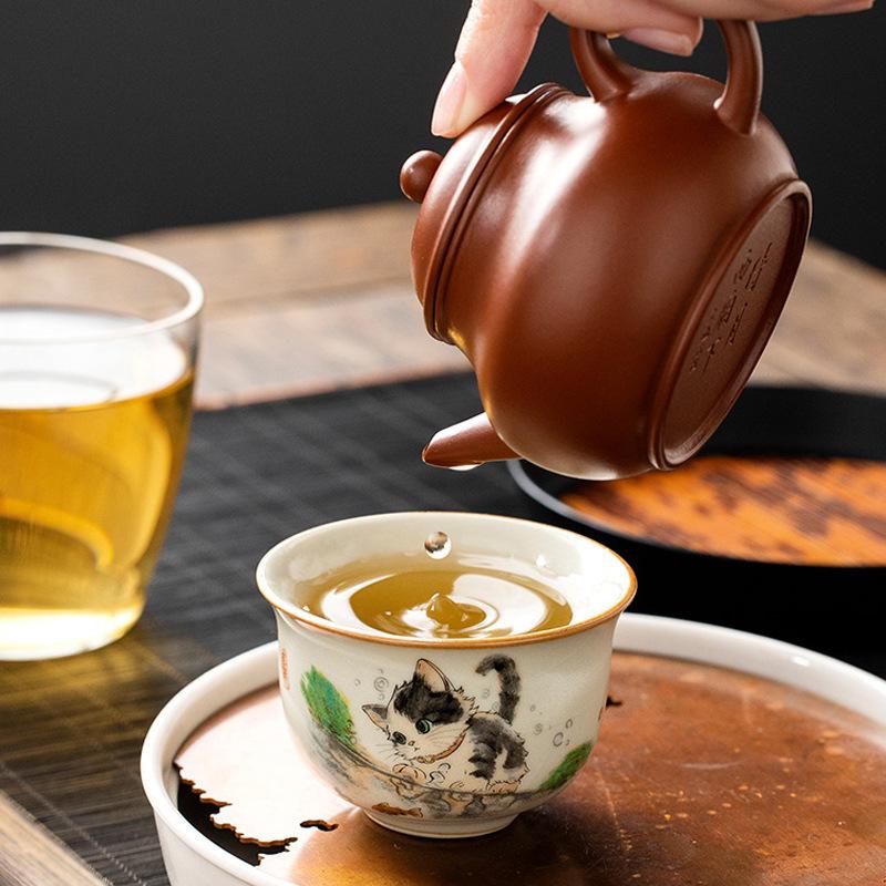 Ruyao Cute Cat Round Ding Ceramic Tea Cup Kung Fu Tea Set Tasting Cup High end Exquisite Tea Drinking Master
Ruyao Cute Cat Round Ding Ceramic Tea Cup Kung Fu Tea Set Tasting Cup High end Exquisite Tea Drinking Master