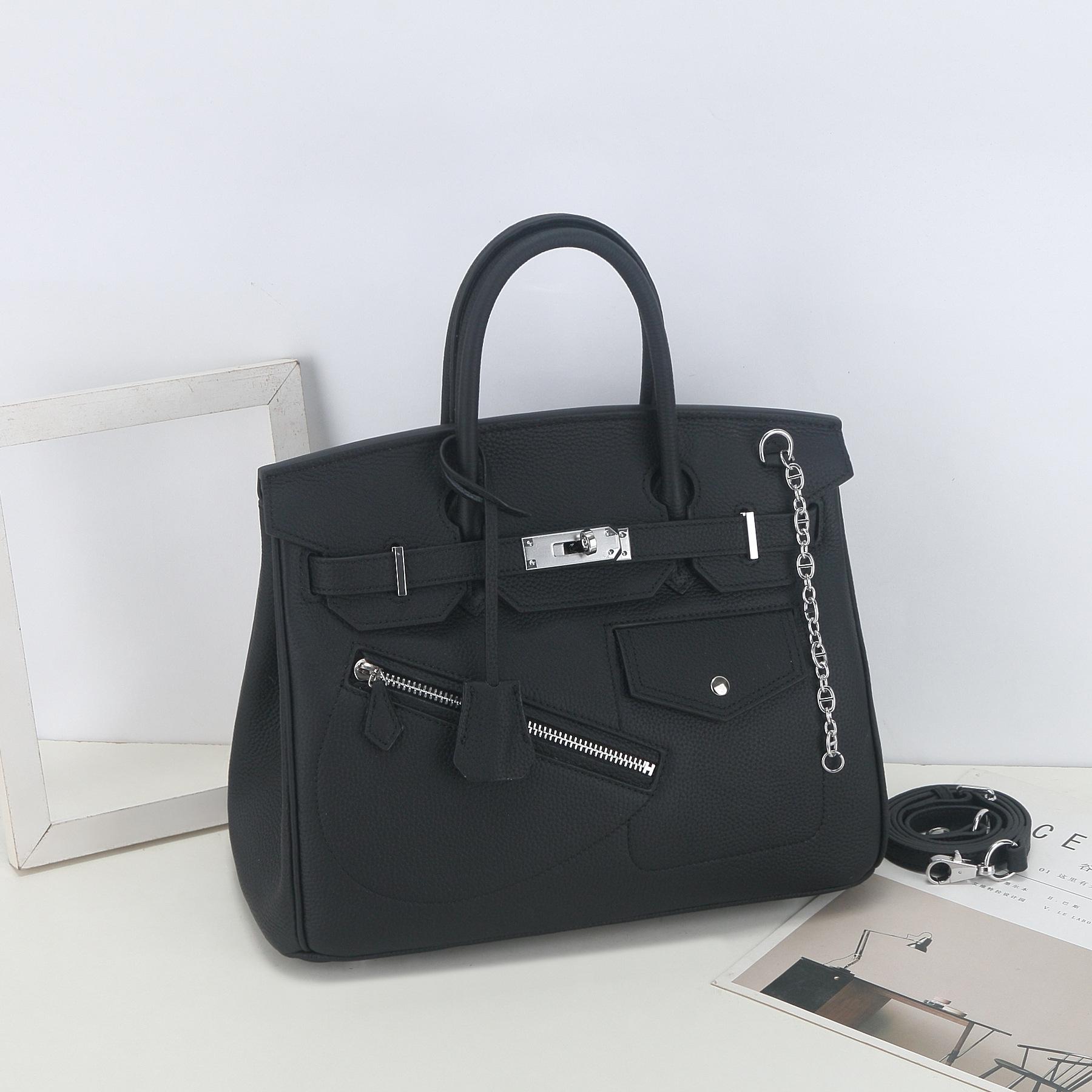 Leather Rock Punk Motorcycle Bag High Sense Fashion Versatile First Layer Cowhide Large Capacity Handbag Women 25cm чорний
Leather Rock Punk Motorcycle Bag High Sense Fashion Versatile First Layer Cowhide Large Capacity Handbag Women 25cm чорний