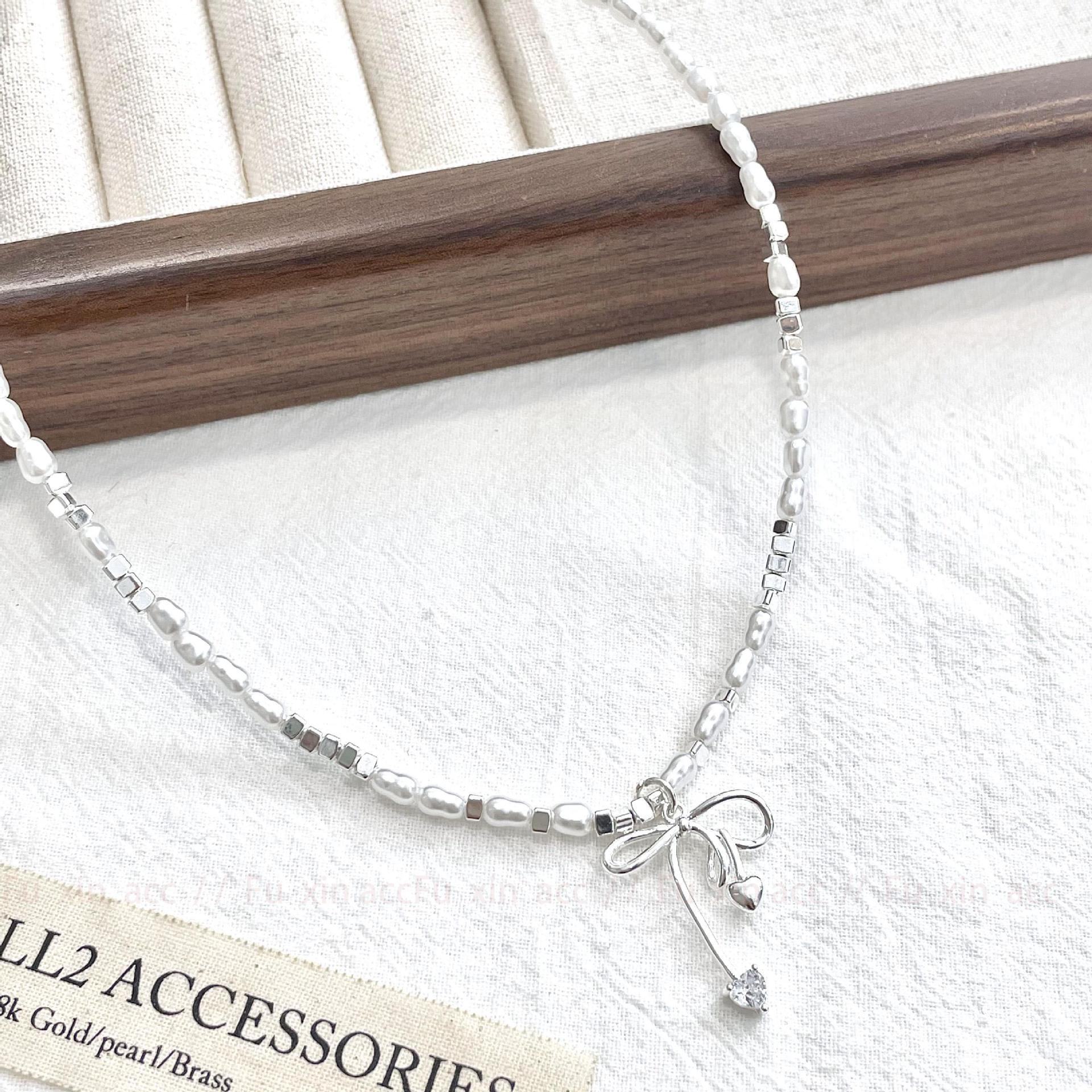 Летнее серебряное жемчужное ожерелье-бантик: Элегантная, роскошная и женственная цепочка на ключицу N0837