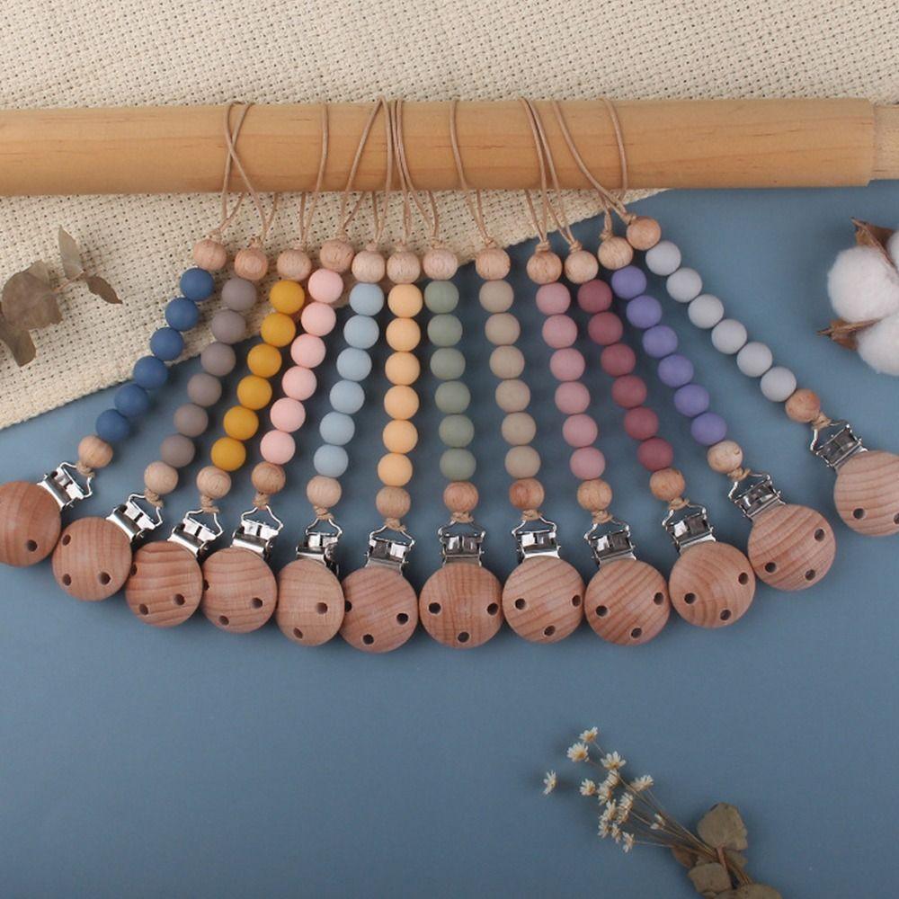 Wooden Food Grade Multi-color Pacifier Clips Chains Silicone Nipple Holder Baby Pacifier Chain
Wooden Food Grade Multi-color Pacifier Clips Chains Silicone Nipple Holder Baby Pacifier Chain