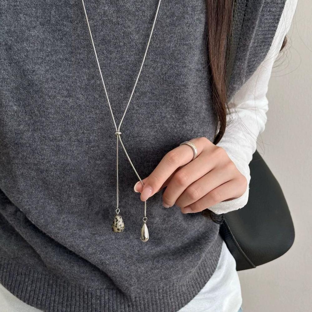 New Geometry Water Drop Tiger Eye Stone Pulling Rope Necklace for Women s Trendy Light Luxury Long Sweater Chain Accessories
New Geometry Water Drop Tiger Eye Stone Pulling Rope Necklace for Women s Trendy Light Luxury Long Sweater Chain Accessories