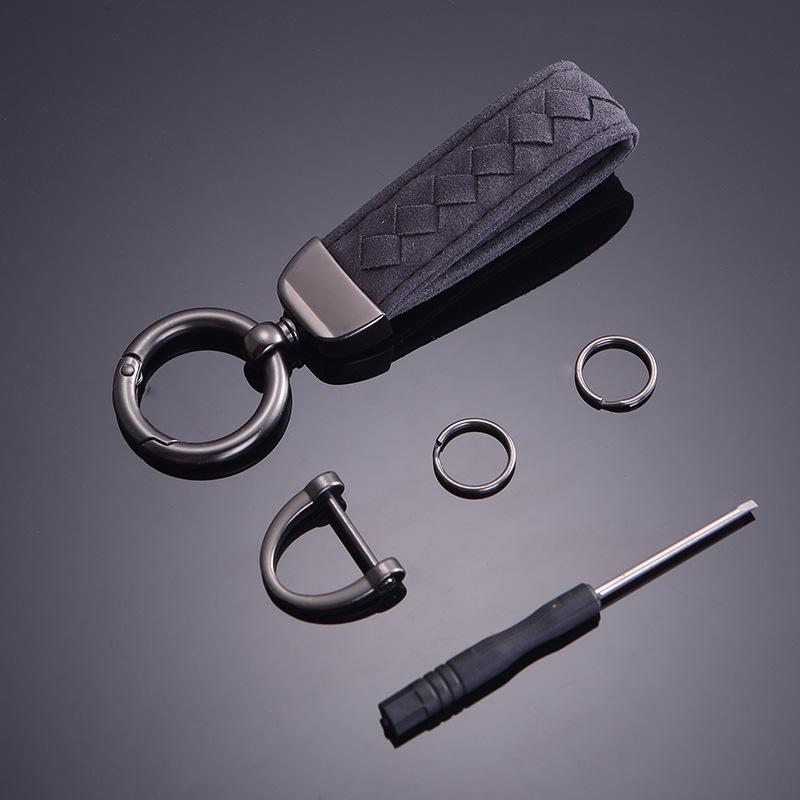 Модный плетеный брелок из замши: Металлические подвесные аксессуары с защитой от падения
Модный плетеный брелок из замши: Металлические подвесные аксессуары с защитой от падения