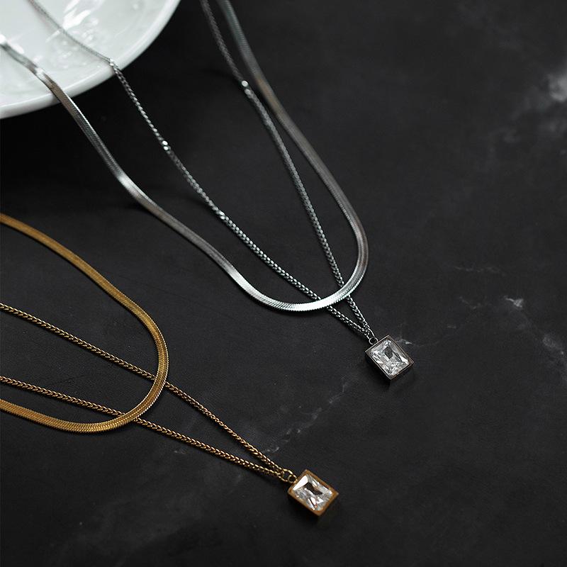 Titanium Steel Double Layer Zircon Necklace with Real Gold Plating – European and American Style
Titanium Steel Double Layer Zircon Necklace with Real Gold Plating – European and American Style