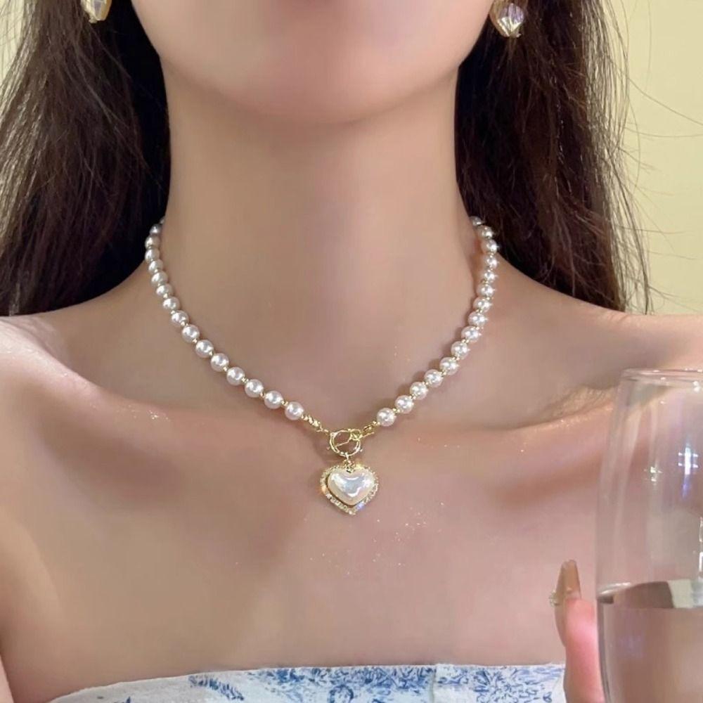 Модная цепочка на ключицу с жемчугом и пряжкой в форме сердца, подвески на ключицу, цепочка на свадьбу и банкет
Модная цепочка на ключицу с жемчугом и пряжкой в форме сердца, подвески на ключицу, цепочка на свадьбу и банкет
