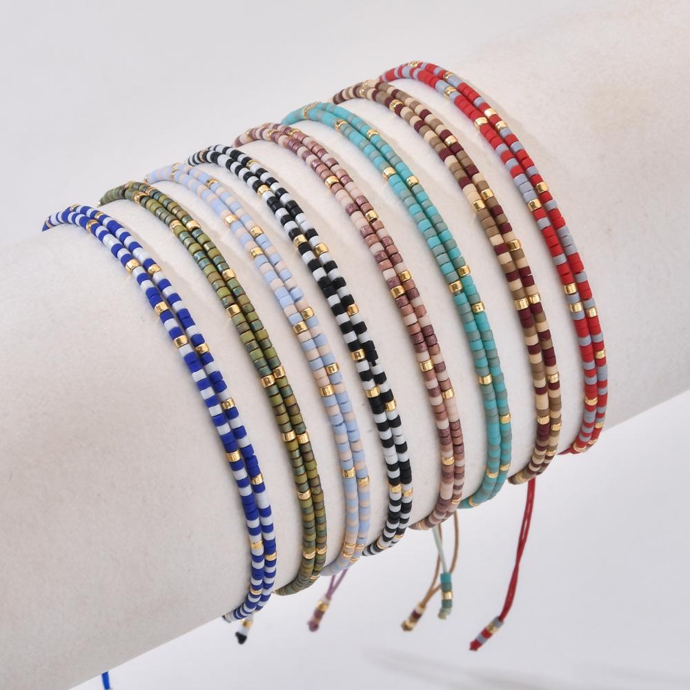 Bohemian Style Colorful Handmade Seed Bead Bracelet - Intricate Design with Fine Woven Drawstring.
Bohemian Style Colorful Handmade Seed Bead Bracelet - Intricate Design with Fine Woven Drawstring.