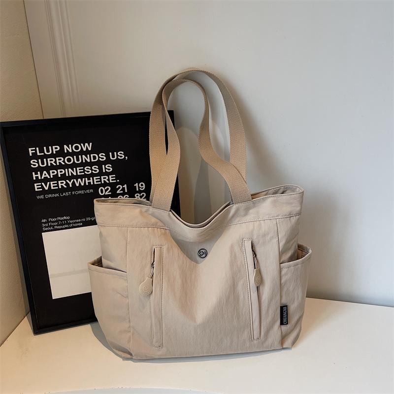 New Korean Style Canvas Tote Shoulder Bag Large Capacity Commuting Handle Bag for Women Comfortable and Versatile Commuting Bag
New Korean Style Canvas Tote Shoulder Bag Large Capacity Commuting Handle Bag for Women Comfortable and Versatile Commuting Bag