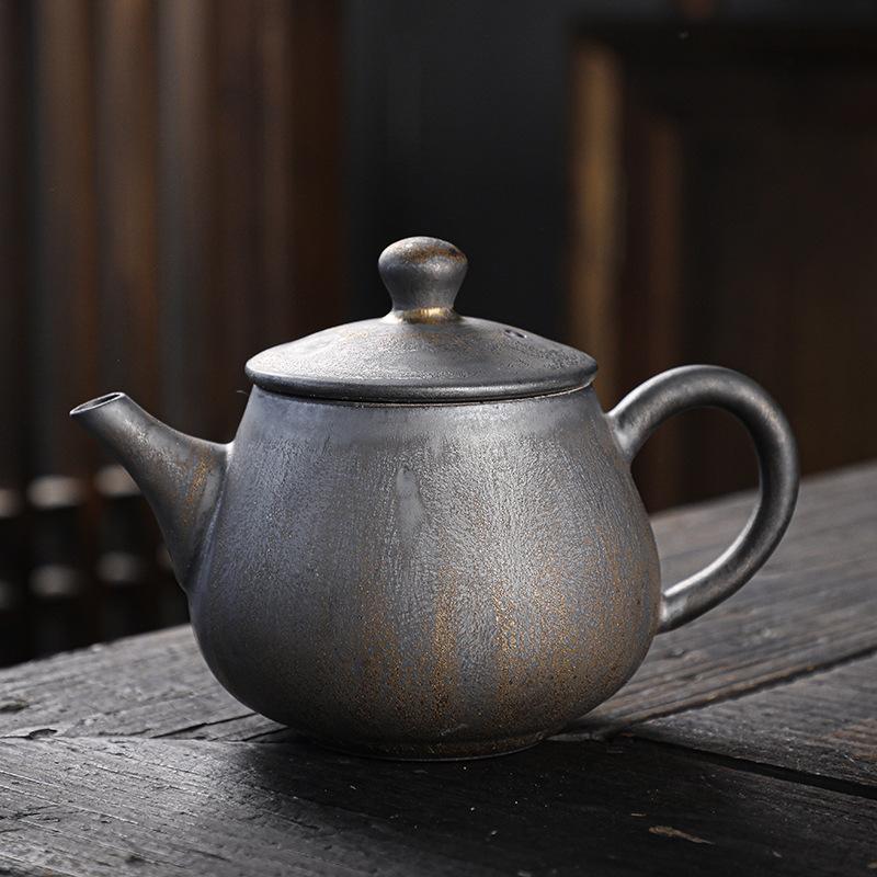Coarse pottery teapot single pot household Japanese retro kiln change gilt rust glaze ceramic kung fu tea set tea side pot
Coarse pottery teapot single pot household Japanese retro kiln change gilt rust glaze ceramic kung fu tea set tea side pot