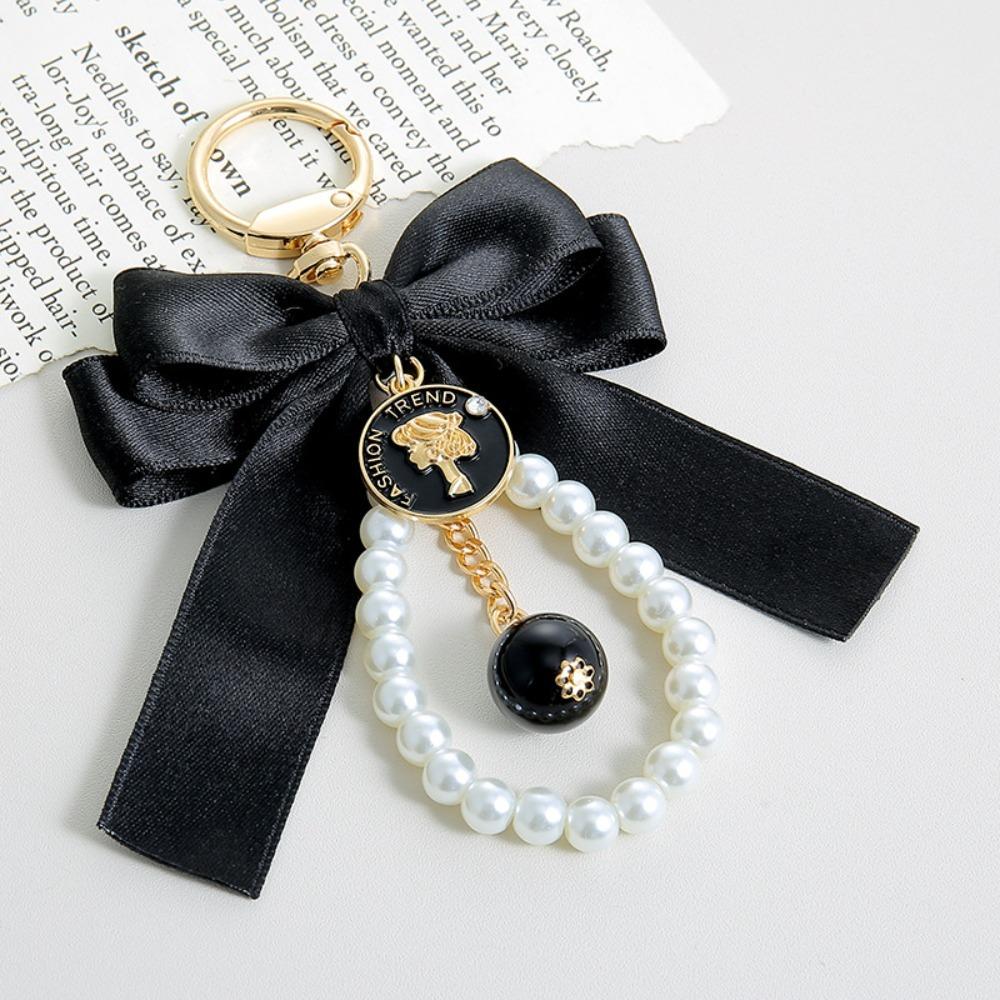 Pearl Chain Bow Key Chain Big Bow Car Keychain Fashion Car Key Holder чорний
Pearl Chain Bow Key Chain Big Bow Car Keychain Fashion Car Key Holder чорний