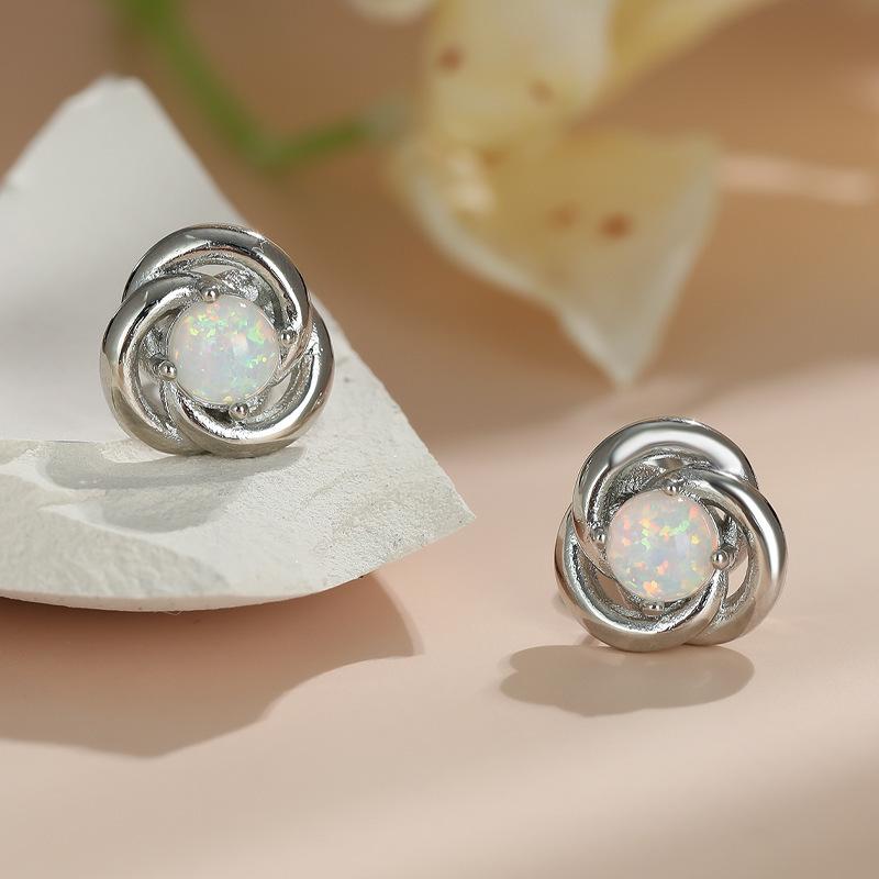 Rose gold four-claw blue winding stud earrings cute earrings simple personalized jewelry
Rose gold four-claw blue winding stud earrings cute earrings simple personalized jewelry