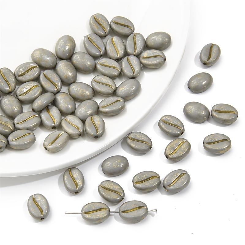 60pcs Vintage Acrylic Coffee Bean Beads, Multicolor Imitation Coffee Pods with Golden Piercing Details for DIY Jewelry Making – Ideal for Bracelets grey
60pcs Vintage Acrylic Coffee Bean Beads, Multicolor Imitation Coffee Pods with Golden Piercing Details for DIY Jewelry Making – Ideal for Bracelets grey