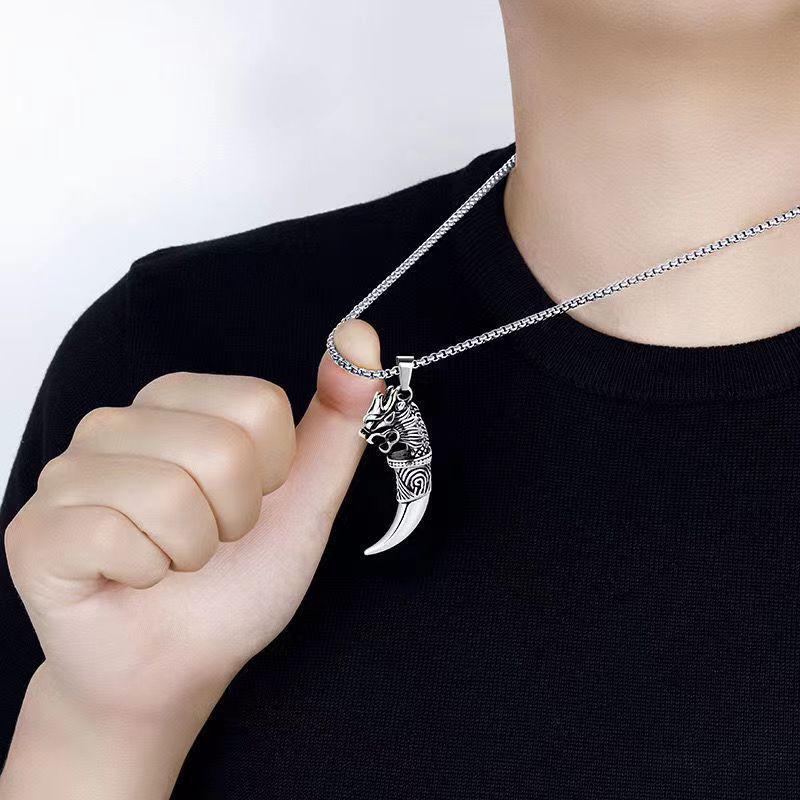 Trendy European & American Wolf Tooth Necklace: High-Design, Luxury Hip-Hop Pendant for Men’s Fashion Wolf Tooth - 60cm Titanium Steel Chain
Trendy European & American Wolf Tooth Necklace: High-Design, Luxury Hip-Hop Pendant for Men’s Fashion Wolf Tooth - 60cm Titanium Steel Chain