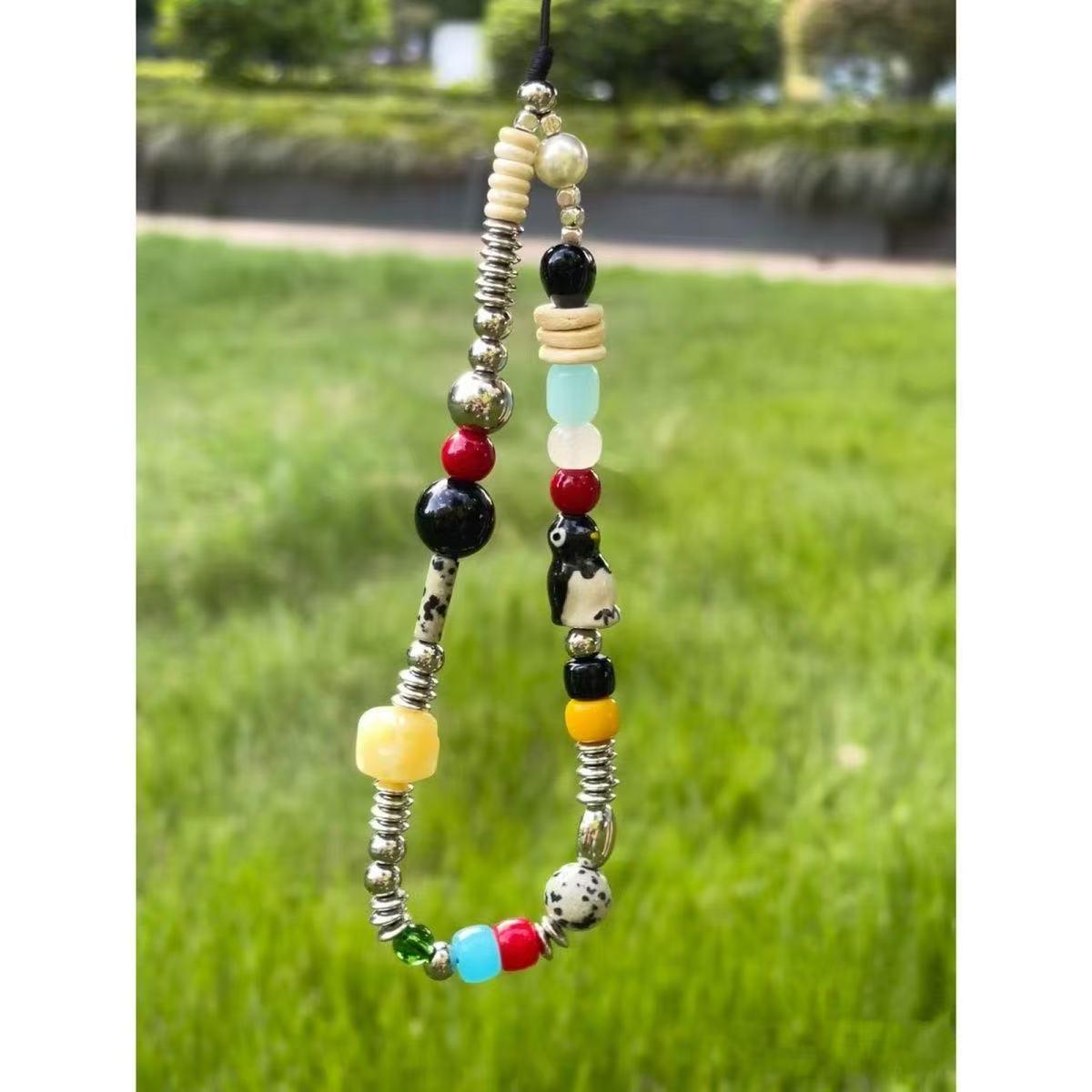 Sicilian Handmade Beaded Phone Chain & Camera Charm Lanyard - Cute, Universal for Women
Sicilian Handmade Beaded Phone Chain & Camera Charm Lanyard - Cute, Universal for Women