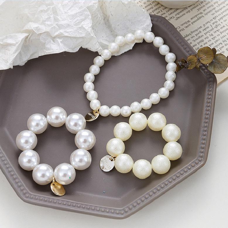 Korean Versatile Sweet Pearl Hair Tie & Beaded Bracelet - Dual-Use Frosted Hair Accessory
Korean Versatile Sweet Pearl Hair Tie & Beaded Bracelet - Dual-Use Frosted Hair Accessory