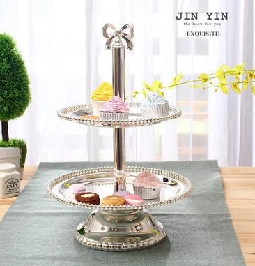 Dessert Table Metal Decorative Display Rack Glass Candy Jar Silver Pearl High Foot Cake Pan Dessert Plate Storage Tray Vase
Dessert Table Metal Decorative Display Rack Glass Candy Jar Silver Pearl High Foot Cake Pan Dessert Plate Storage Tray Vase