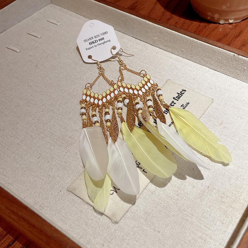 Ethnic style super fairy feather earrings Bohemian style long earrings fashionable and advanced sense of new Chinese earrings
Ethnic style super fairy feather earrings Bohemian style long earrings fashionable and advanced sense of new Chinese earrings