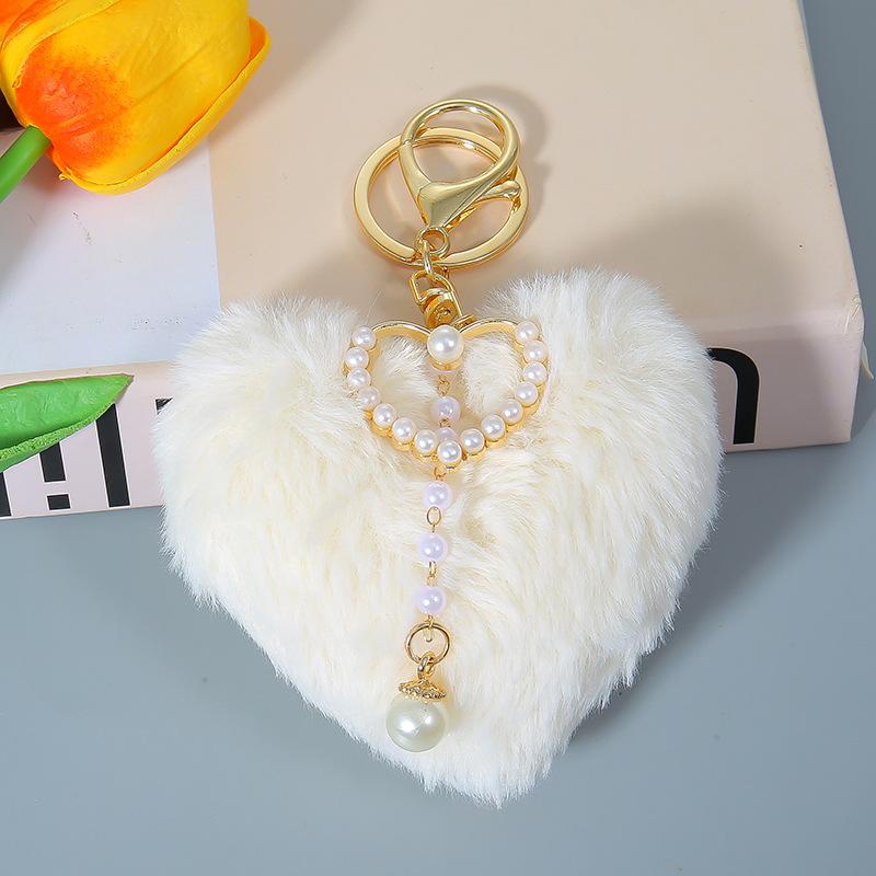 Autumn And Winter Love Hairball Pearl Keychain Peach Heart Bag Pendant Car Accessories Plush Pendant Small Gifts брудно-білий
Autumn And Winter Love Hairball Pearl Keychain Peach Heart Bag Pendant Car Accessories Plush Pendant Small Gifts брудно-білий