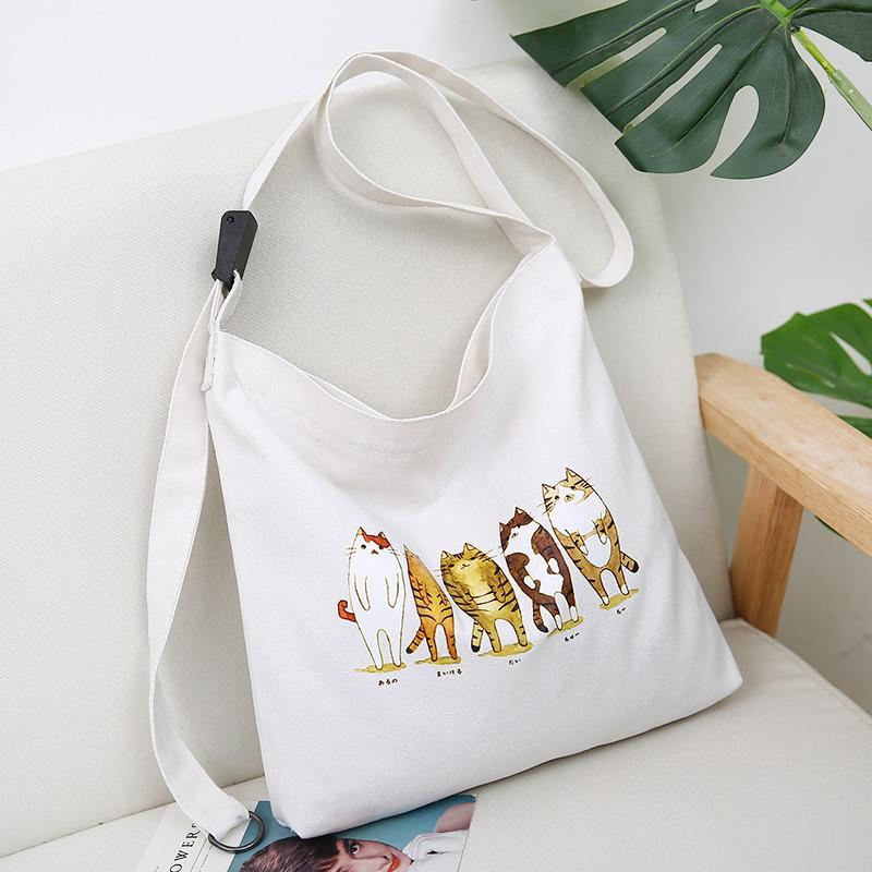 Cartoon canvas women s bag new shoulder student cute creative messenger bag environmentally friendly simple canvas handbag
Cartoon canvas women s bag new shoulder student cute creative messenger bag environmentally friendly simple canvas handbag