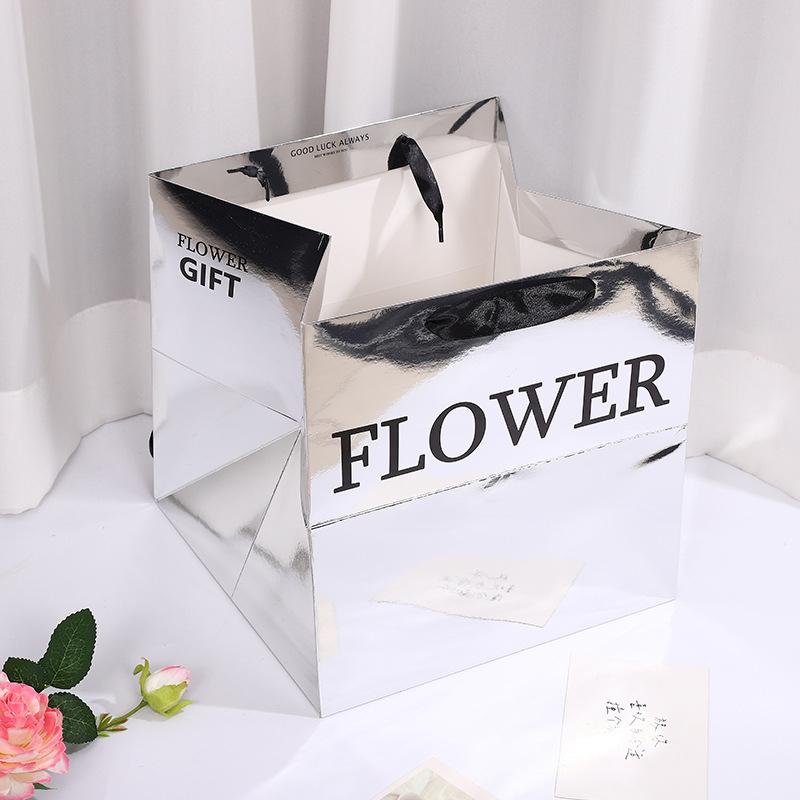 27*27*27 см Зеркальная Сумка для букета ручной работы Материалы для флористов Подарок на День матери Подарочная Сумка для цветов Сумка-тоут серебряный
27*27*27 см Зеркальная Сумка для букета ручной работы Материалы для флористов Подарок на День матери Подарочная Сумка для цветов Сумка-тоут серебряный