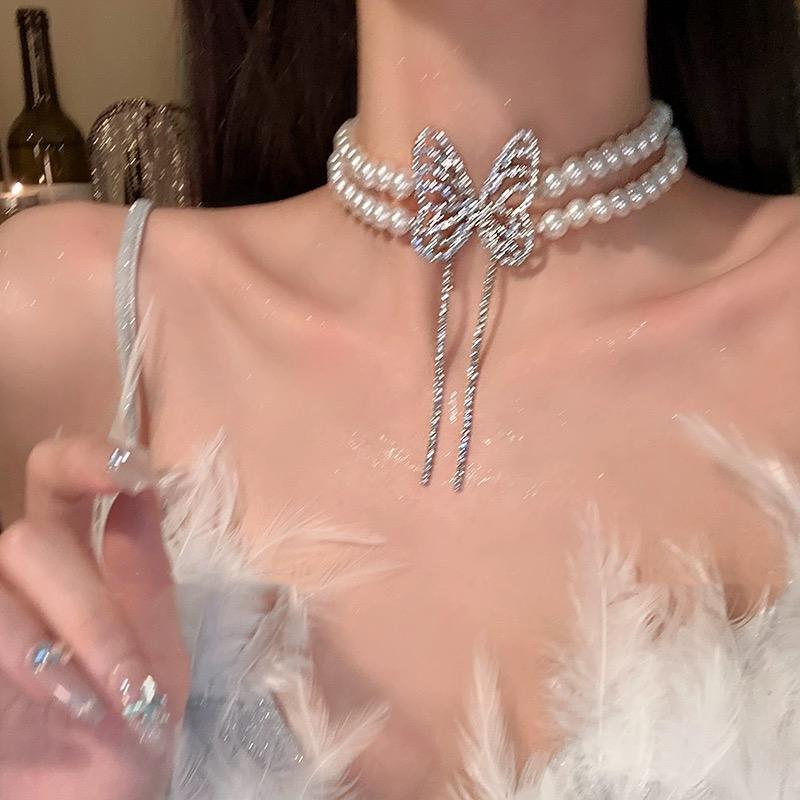 Luxury Shiny Zircon Pearl Butterfly Tassel Necklace for Women Vintage White Double Layered Pearl Choker Necklace Wedding Jewelry
Luxury Shiny Zircon Pearl Butterfly Tassel Necklace for Women Vintage White Double Layered Pearl Choker Necklace Wedding Jewelry