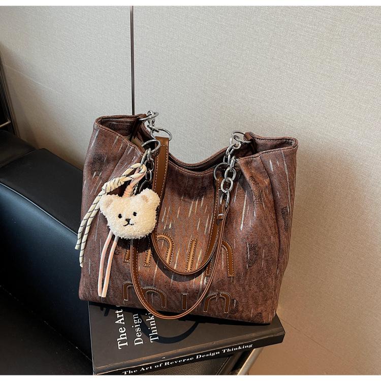 High-value work commute summer tote bag large-capacity new shoulder bag commuter bag темно-коричневого
High-value work commute summer tote bag large-capacity new shoulder bag commuter bag темно-коричневого