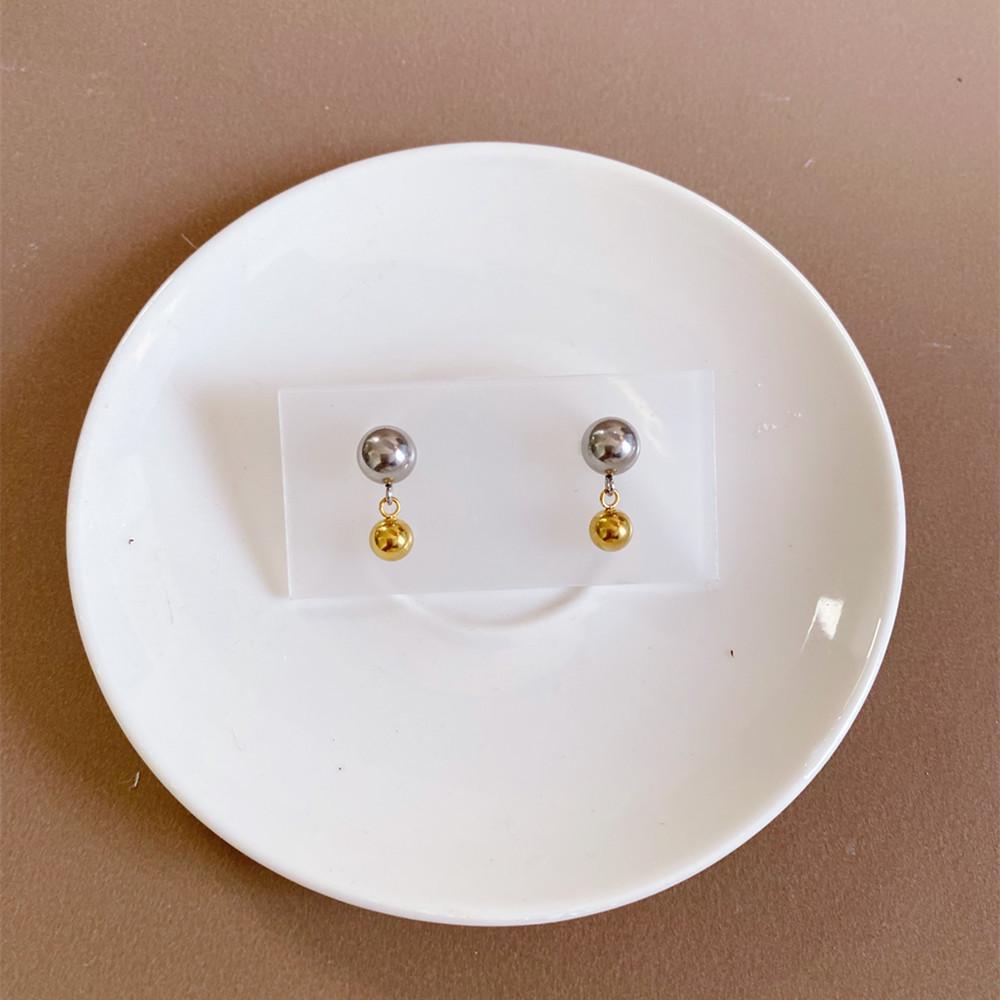 European and American Two-Tone Stainless Steel Round Ball Earrings срібний/золотий
European and American Two-Tone Stainless Steel Round Ball Earrings срібний/золотий