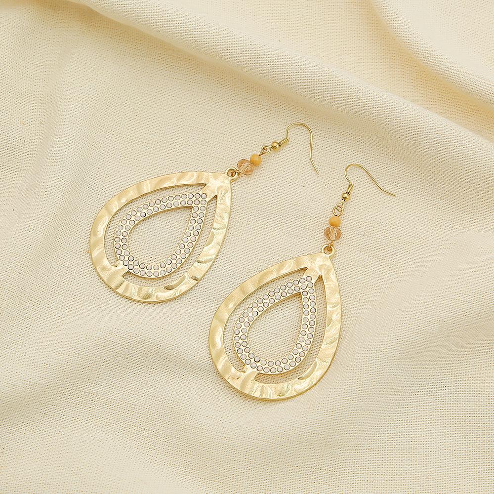 Irregular Surface Zinc Alloy Teardrop Earrings - Double Layer, Retro Hollow Design for Women
Irregular Surface Zinc Alloy Teardrop Earrings - Double Layer, Retro Hollow Design for Women