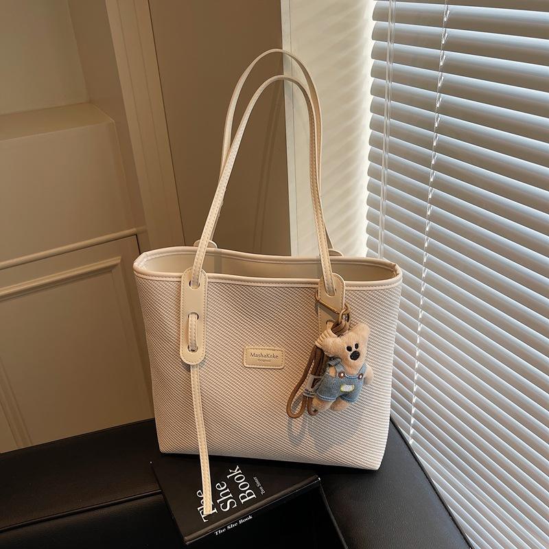 Retro large-capacity tote bag women s 2025 new fashion texture shoulder bag simple work bag
Retro large-capacity tote bag women s 2025 new fashion texture shoulder bag simple work bag