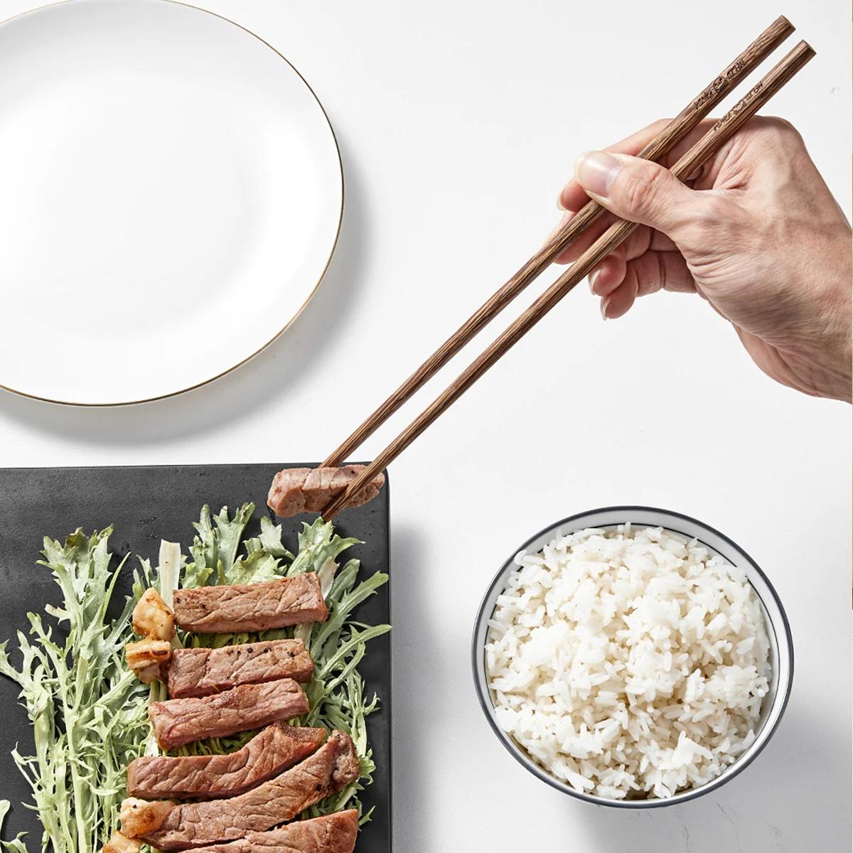 30cm chicken wing wood long chopsticks no paint no wax can be used for deep frying hot pot Chinese chopsticks
30cm chicken wing wood long chopsticks no paint no wax can be used for deep frying hot pot Chinese chopsticks