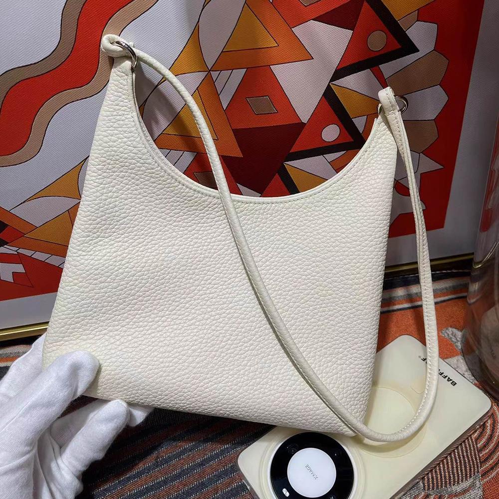 Минималистская сумка через плечо из коровьей кожи Head Layer, новая мягкая и липкая маленькая сумка, модная сумка через плечо, женская сумка из натуральной кожи Small size 21 x 4 x 20+cm белый
Минималистская сумка через плечо из коровьей кожи Head Layer, новая мягкая и липкая маленькая сумка, модная сумка через плечо, женская сумка из натуральной кожи Small size 21 x 4 x 20+cm белый