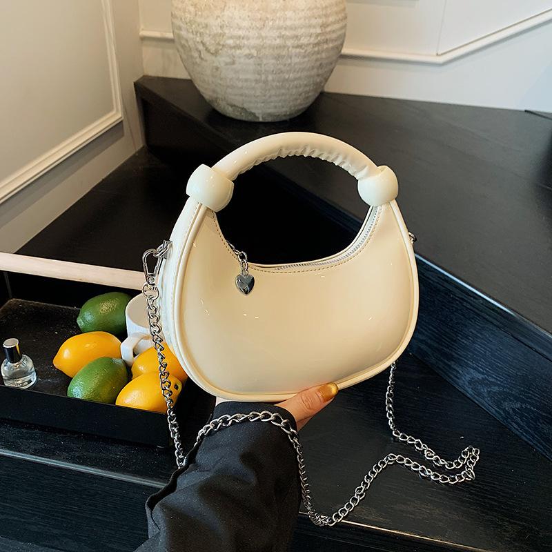 Red bag women s 2025 new trendy summer high-end work handbag popular silver shoulder messenger bag 21.5*6*14
Red bag women s 2025 new trendy summer high-end work handbag popular silver shoulder messenger bag 21.5*6*14