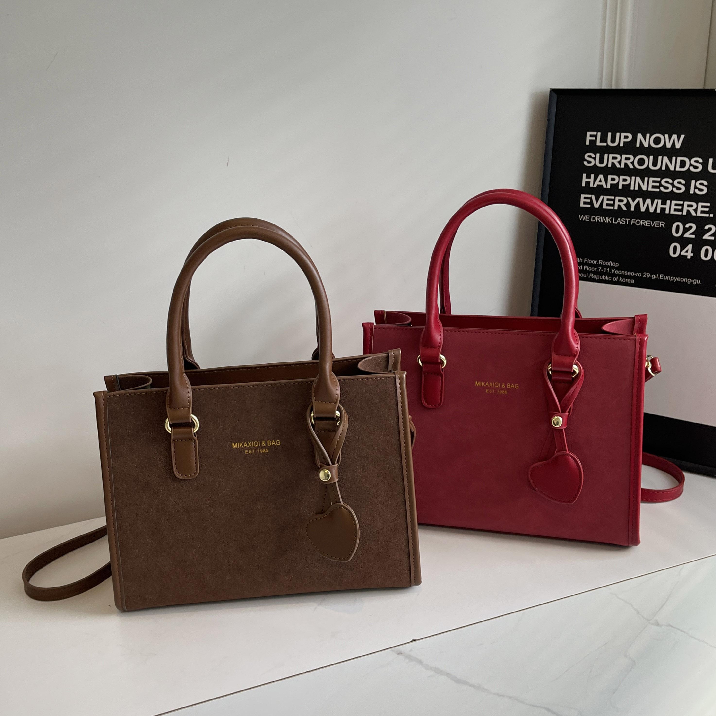 Classic retro bag fashion large-capacity handbag love letters all over the shoulder bag
Classic retro bag fashion large-capacity handbag love letters all over the shoulder bag