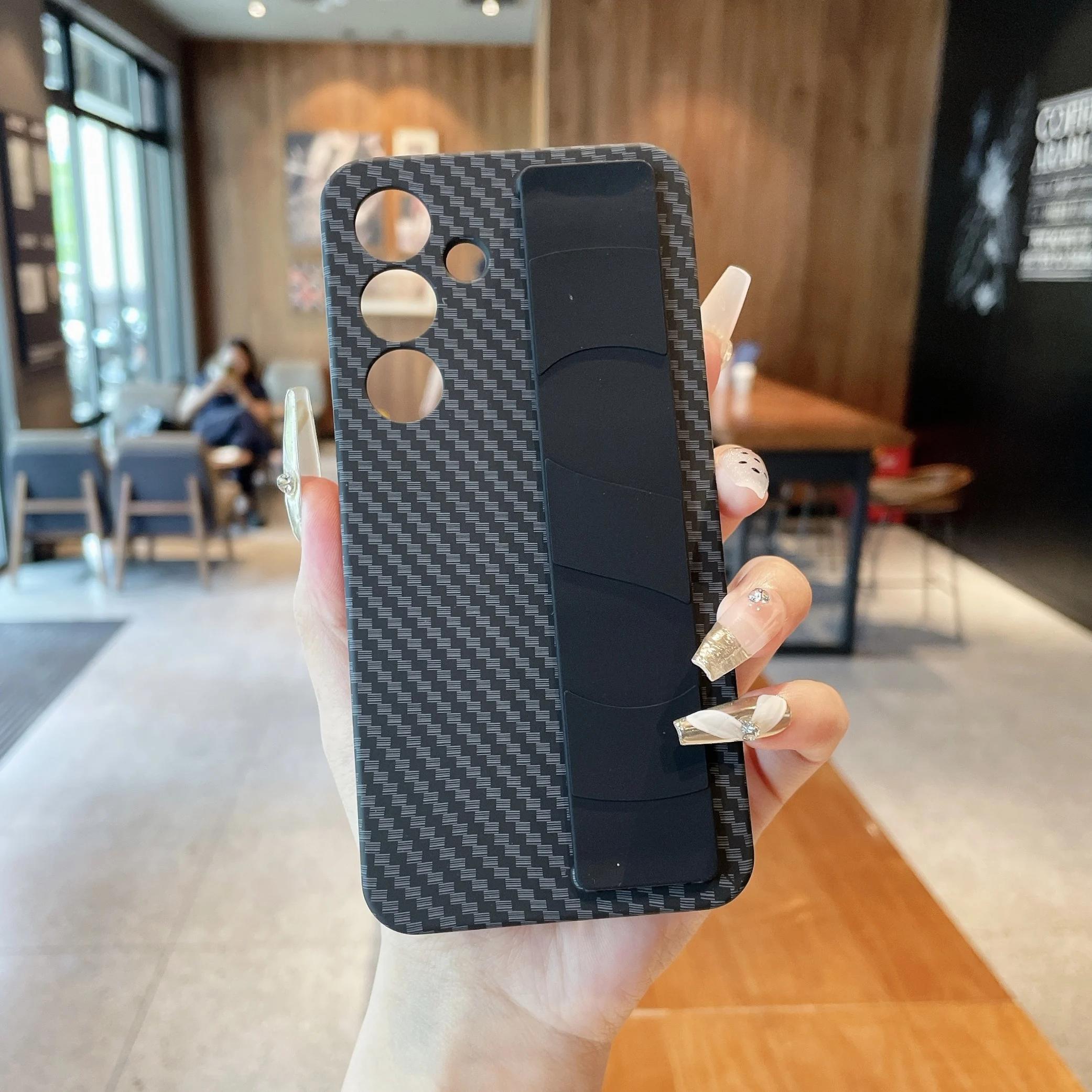 S25 Ultra Wrist Strap Carbon Fiber Phone Case for Samsung Galaxy S25 S24 S23 Ultra Plus 5G Silicone Wristband Protective Cover Galaxy S23
S25 Ultra Wrist Strap Carbon Fiber Phone Case for Samsung Galaxy S25 S24 S23 Ultra Plus 5G Silicone Wristband Protective Cover Galaxy S23