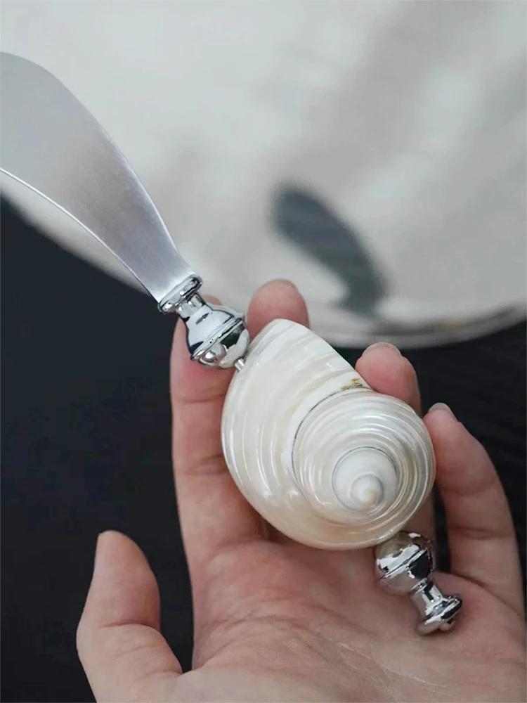 Креативний набір з трьох предметів з натуральної раковини: виделка, ложка, ніж та столовий посуд з нержавіючої сталі
Креативний набір з трьох предметів з натуральної раковини: виделка, ложка, ніж та столовий посуд з нержавіючої сталі