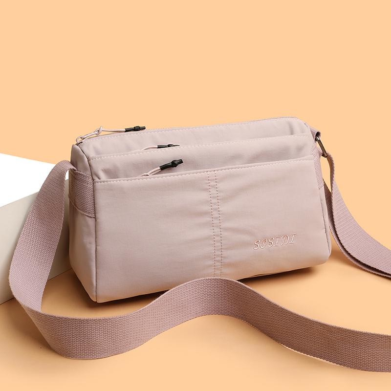 New women s crossbody bag - water-resistant, ultra-light fabric bag with multiple compartments, small square bag, gender-neutral (20cm<Max Length<30cm) рожевий
New women s crossbody bag - water-resistant, ultra-light fabric bag with multiple compartments, small square bag, gender-neutral (20cm<Max Length<30cm) рожевий
