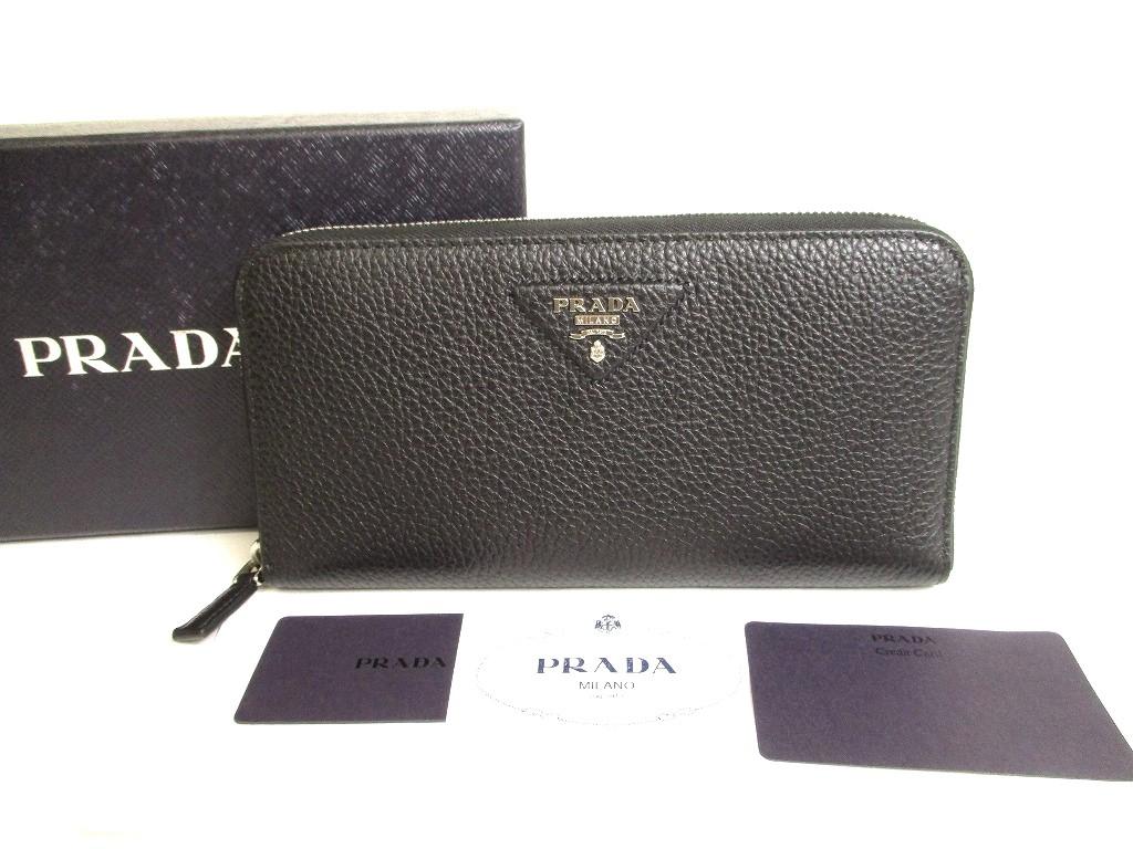 Автентичний довгий гаманець PRADA з чорної телячої шкіри на круглій блискавці №9939, відремонтований
Автентичний довгий гаманець PRADA з чорної телячої шкіри на круглій блискавці №9939, відремонтований