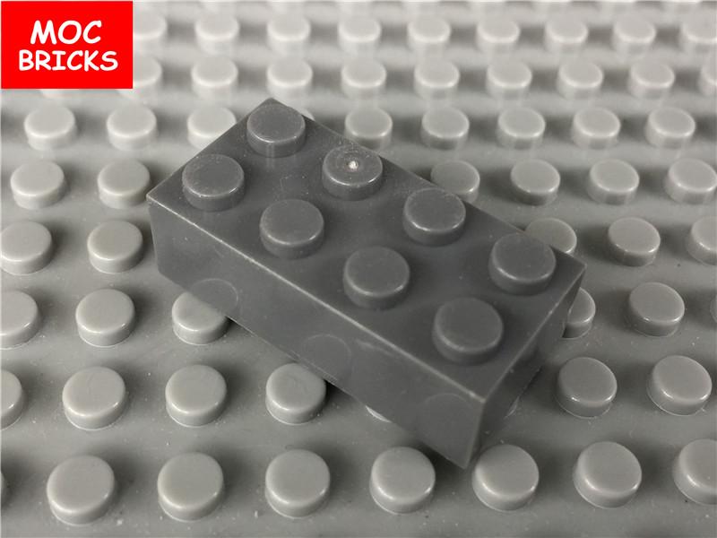 100pcs\lot MOC Bricks Colorful white red black Brick 2x4 3001 City building blocks toys children present темно-сірий
100pcs\lot MOC Bricks Colorful white red black Brick 2x4 3001 City building blocks toys children present темно-сірий