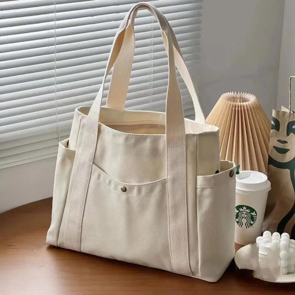 Large Capacity Tote Canvas Bag for Work Outgoing High Appearance Commuting Versatile Art Student Clothing Book Shoulder Bag Bag
Large Capacity Tote Canvas Bag for Work Outgoing High Appearance Commuting Versatile Art Student Clothing Book Shoulder Bag Bag
