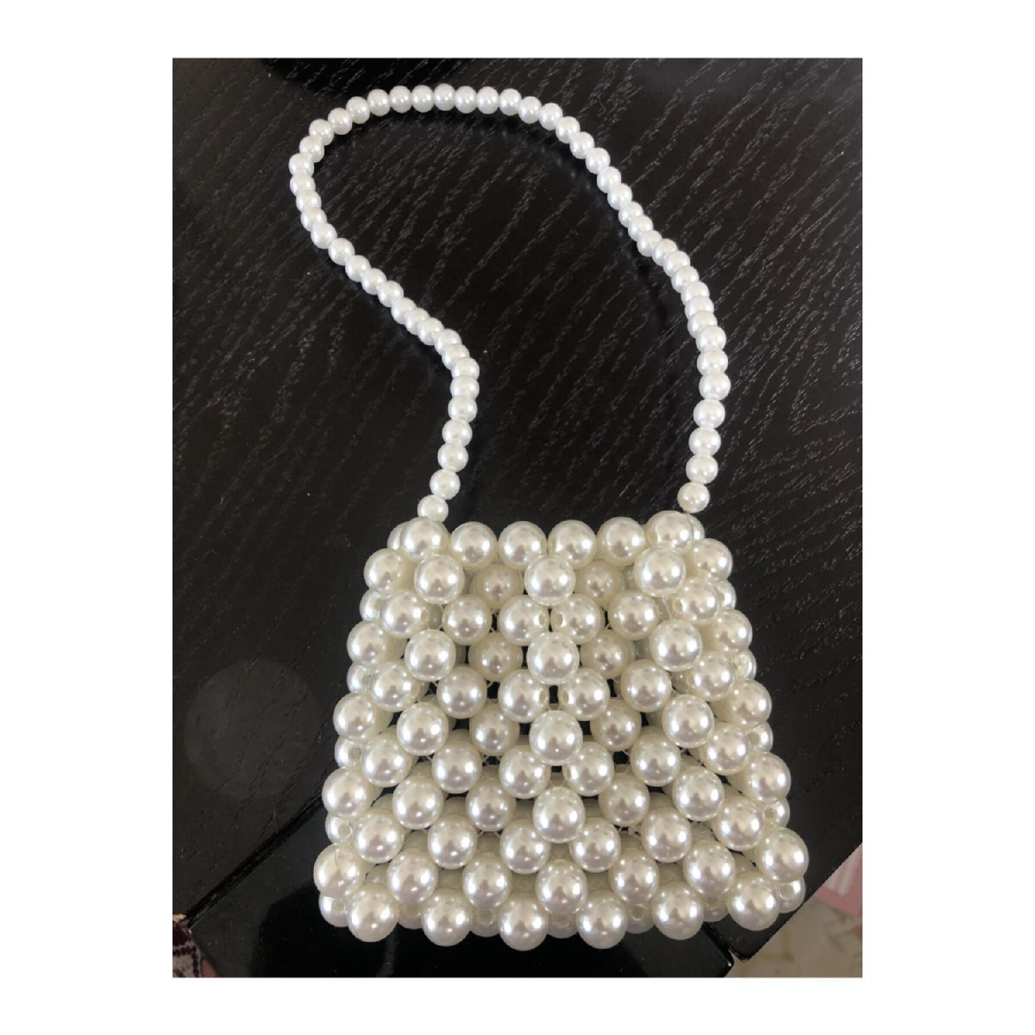 Мини-сумка с жемчугом S
Мини-сумка с жемчугом S