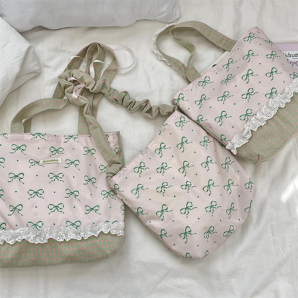 Lace messenger bag spring and summer double-sided shoulder bag women s shopping canvas handheld bento bag
Lace messenger bag spring and summer double-sided shoulder bag women s shopping canvas handheld bento bag