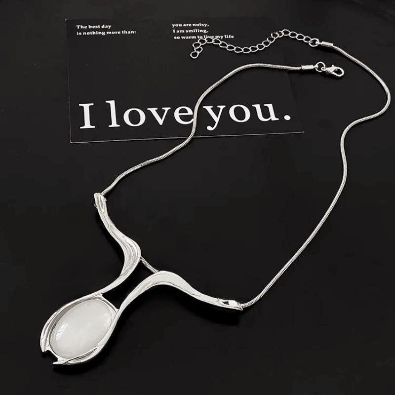 Высококлассное ожерелье-капля из лунного камня: Роскошный чокер в китайском стиле унисекс
Высококлассное ожерелье-капля из лунного камня: Роскошный чокер в китайском стиле унисекс