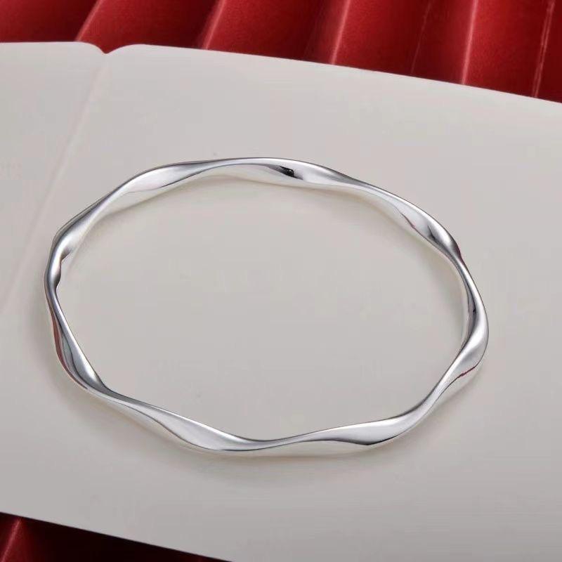 Möbius Wave Silver Bangle - Sterling Silver Twisted Design, Perfect Birthday Gift for Women
Möbius Wave Silver Bangle - Sterling Silver Twisted Design, Perfect Birthday Gift for Women