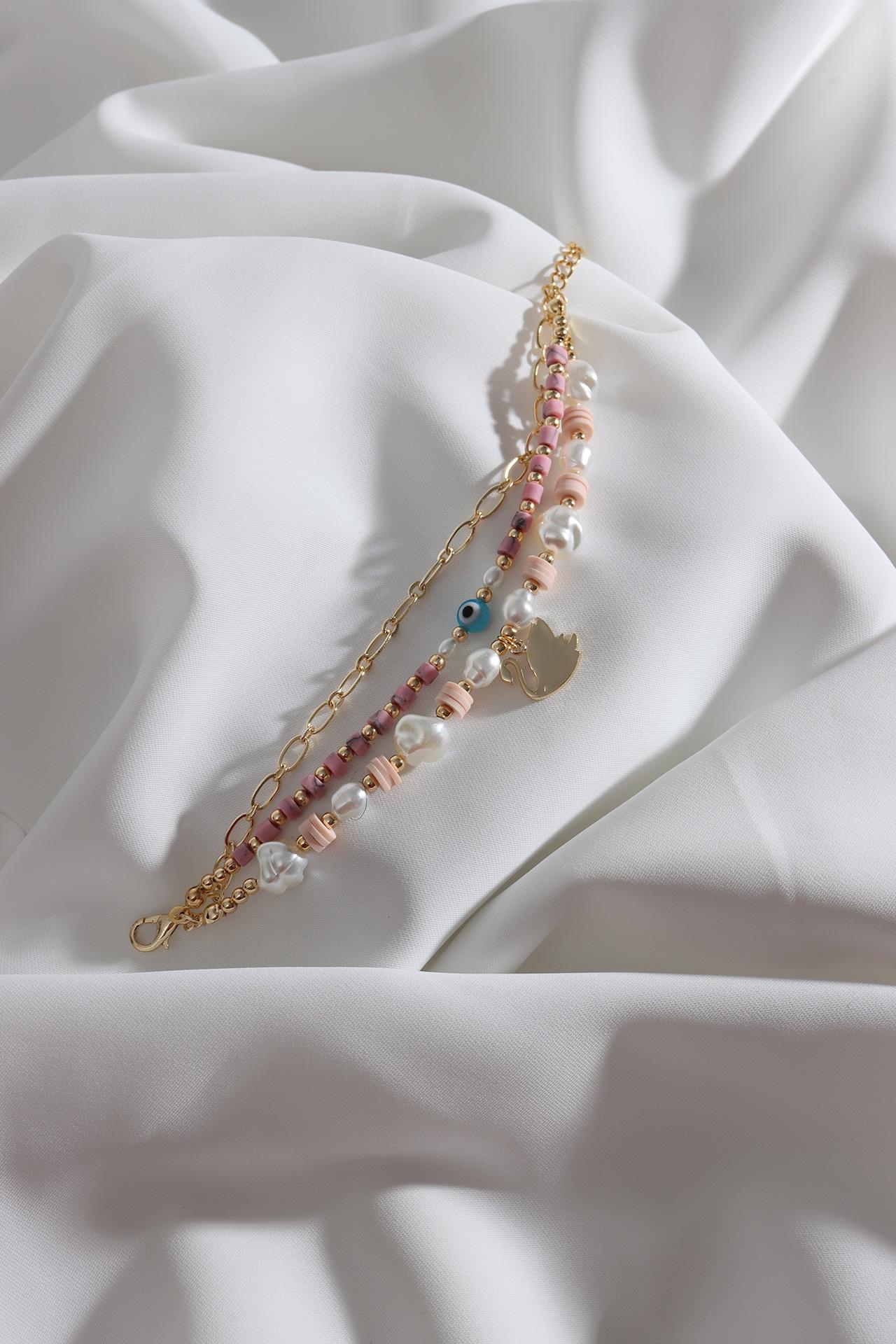 Браслет из 3 частей золотого цвета с розовым жемчугом и жемчугом в виде лебедя 
Браслет из 3 частей золотого цвета с розовым жемчугом и жемчугом в виде лебедя